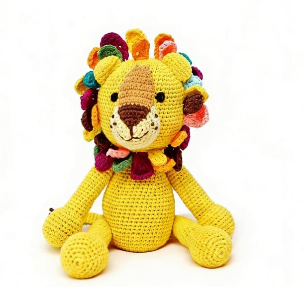 Handmade cute yellow lion crochet stuffed animal. A kawaii amigurumi plushie featuring a vibrant colorful mane and a sweet embroidered smile, perfect as a safari desk pet, nursery decor, or a finished handmade gift.