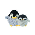 Finished handmade crochet penguin toys from CrochetLink. Soft, egg-shaped penguin stuffed animals with black safety eyes, ready for gifting.