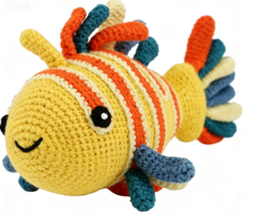 Handmade crochet fish stuffed animal in vibrant colors, a perfect sensory plush toy for babies